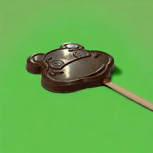 Piruleta de chocolate en forma de rana